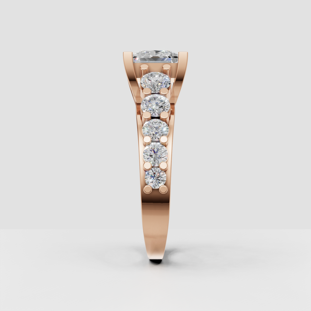 Square diamond engagement ring with graduated round stones on split shank band