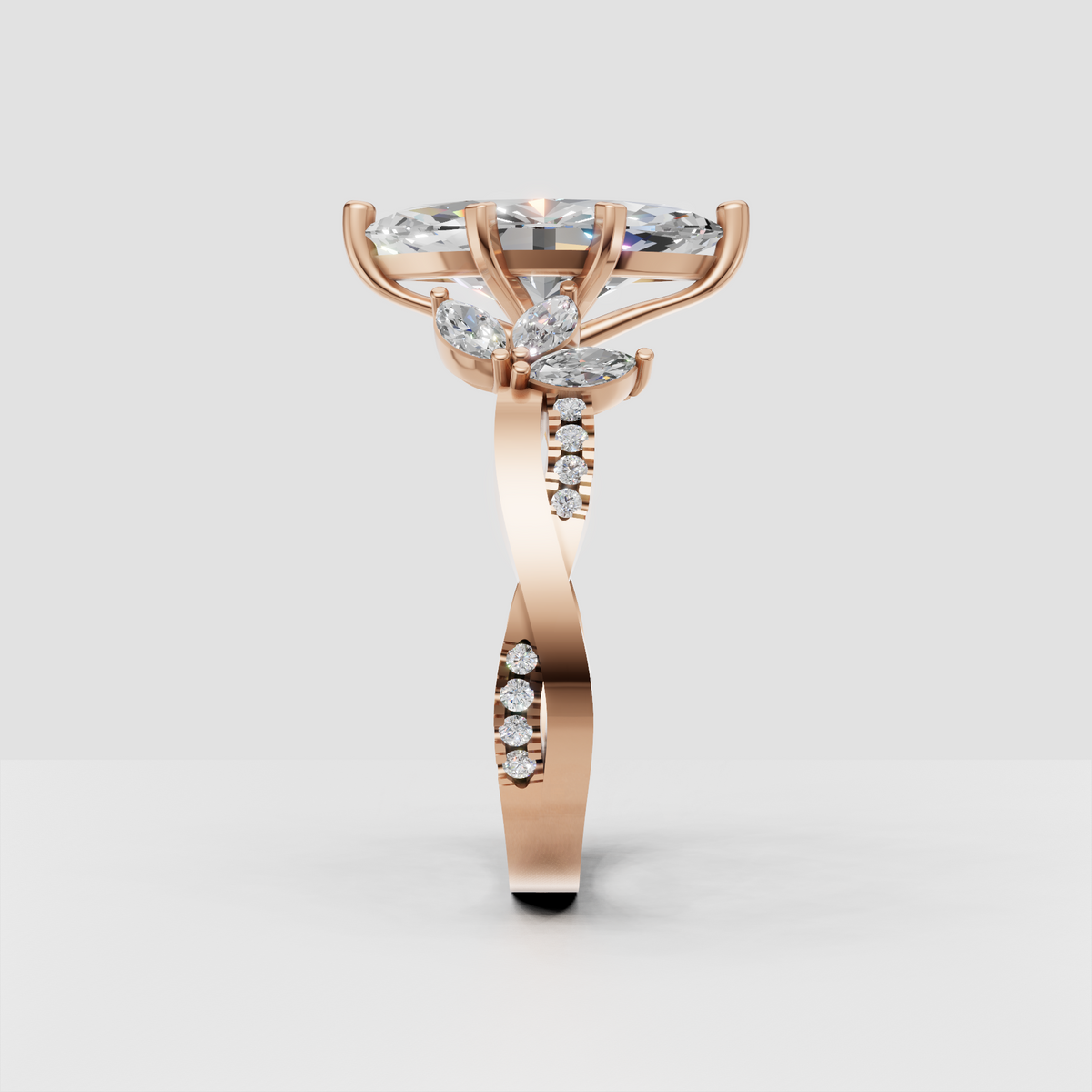 Elegant marquise diamond ring with sculptural yellow gold prongs