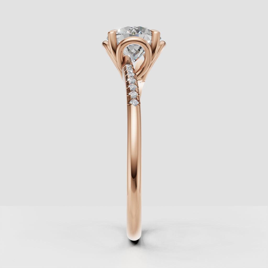 Round cut diamond ring with diamond-set shoulders