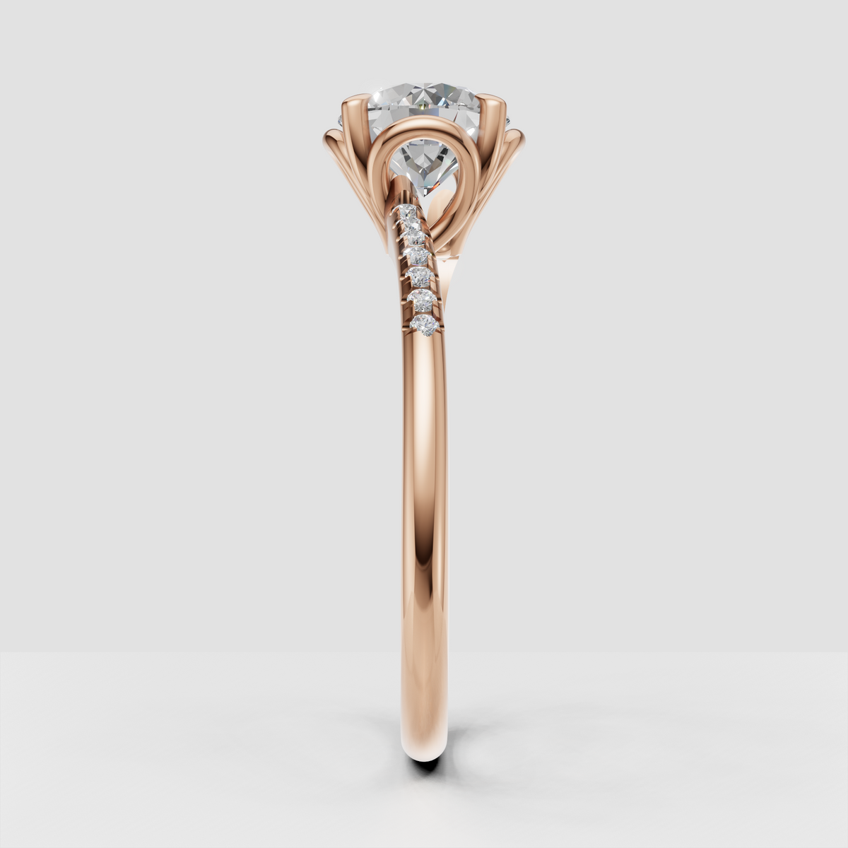 Round cut diamond ring with diamond-set shoulders