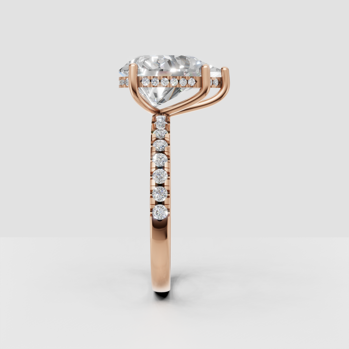 Hidden halo pear diamond engagement ring