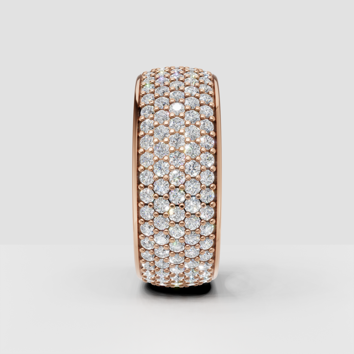 Multi-row round diamond eternity ring with polished gold borders