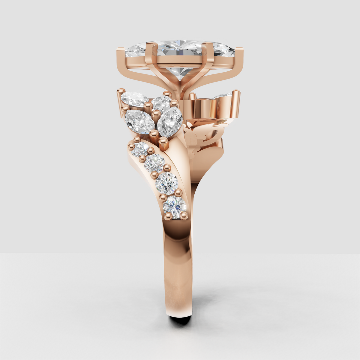 Marquise diamond ring featuring curved overlapping shoulders