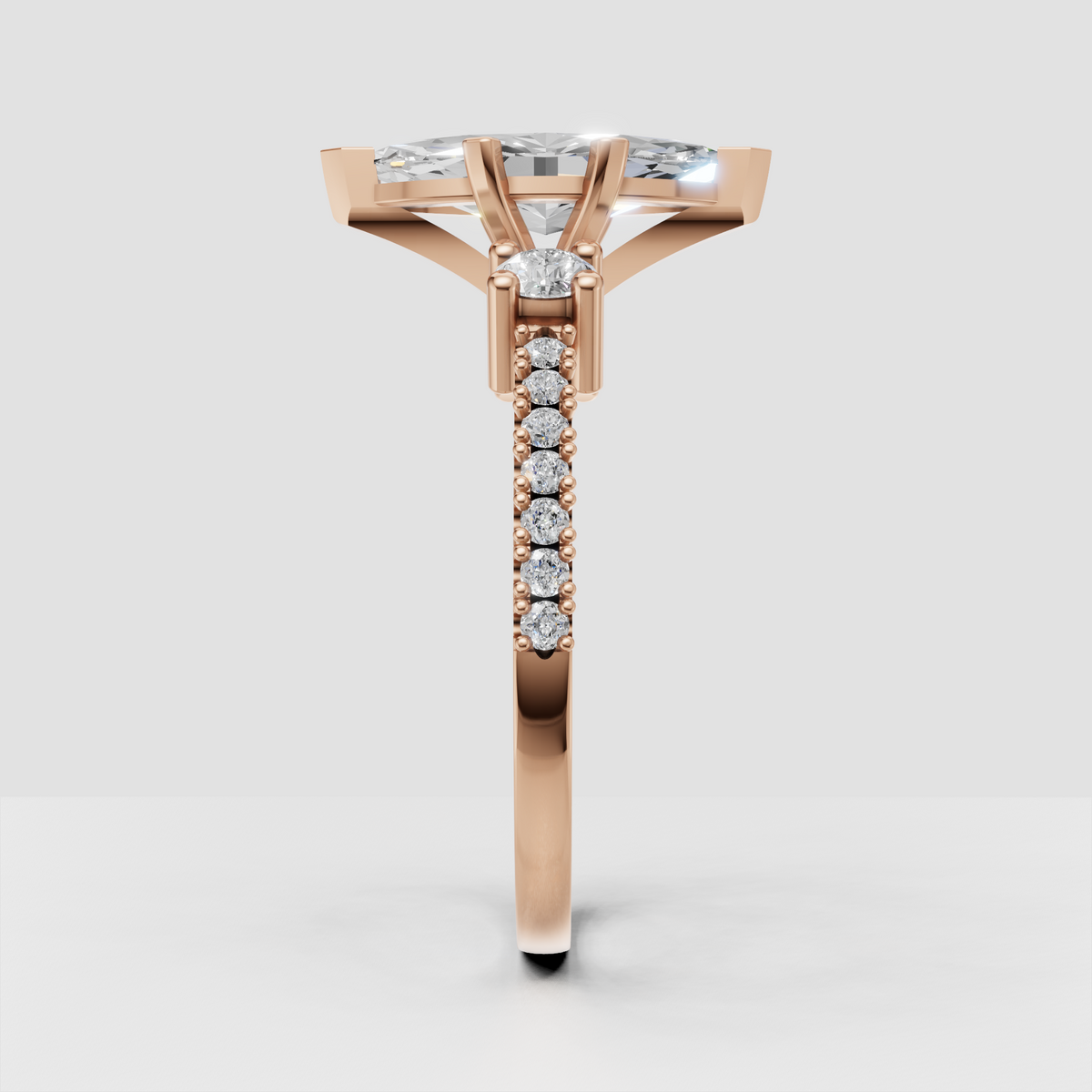 Marquise center diamond ring with round side stones and pave accents
