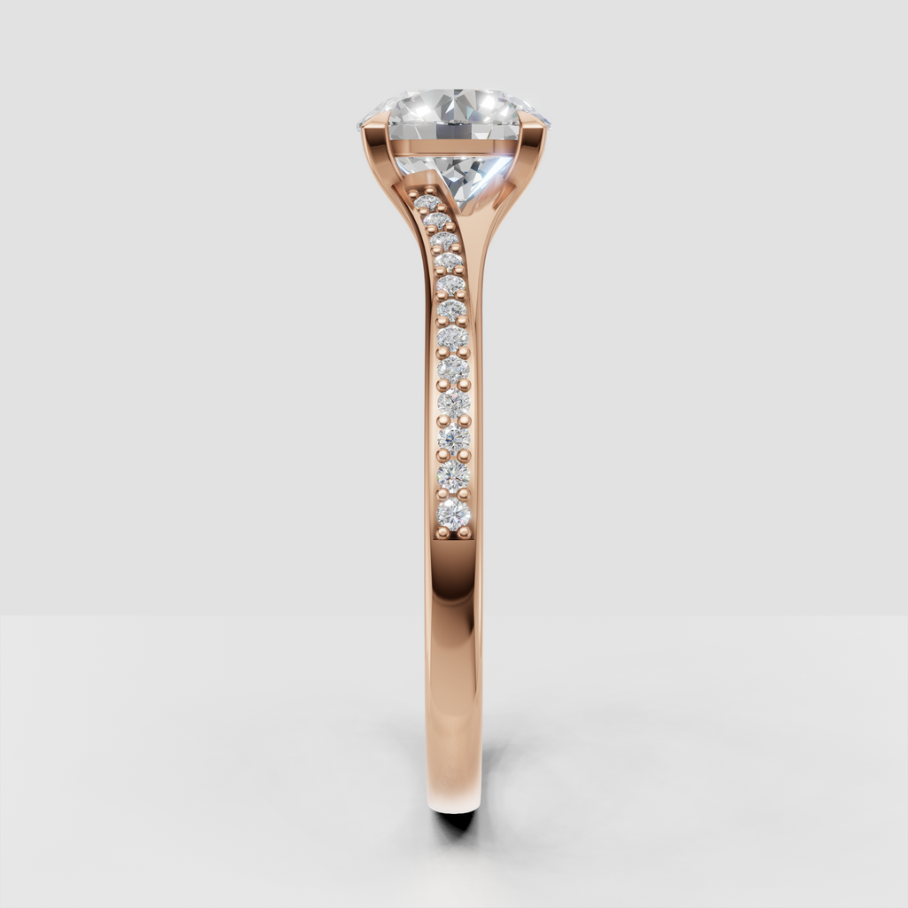 Refined round diamond ring with intricate pave band
