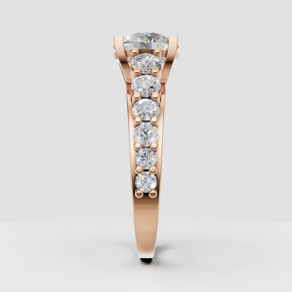 Round diamond cluster engagement ring in polished yellow gold