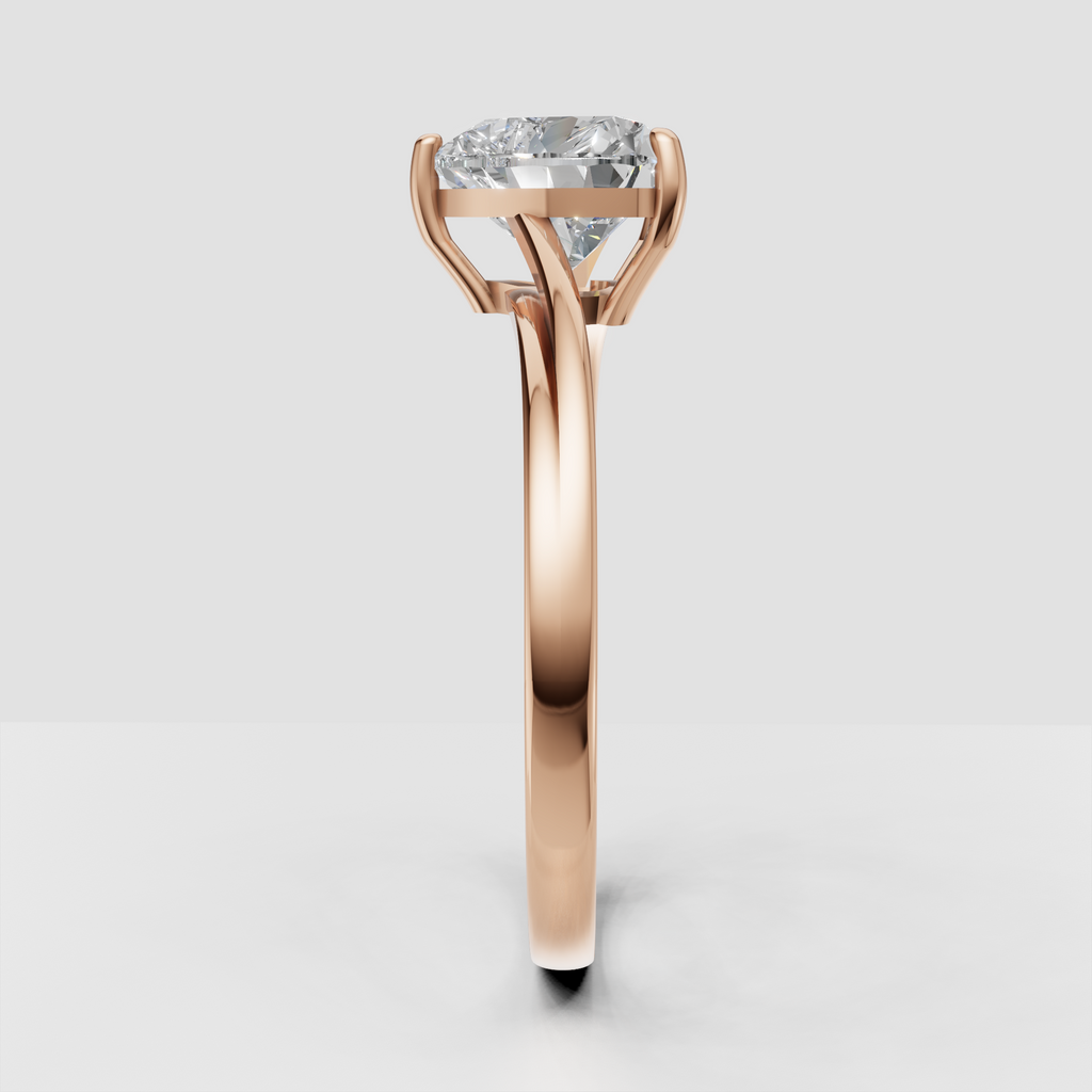 Elegant heart cut engagement ring with open gallery and sleek gold shank