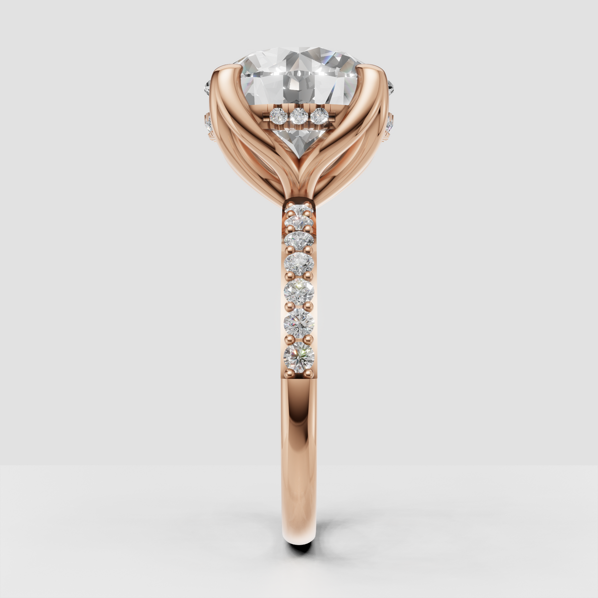 Yellow gold engagement ring with round diamond and beaded detailing