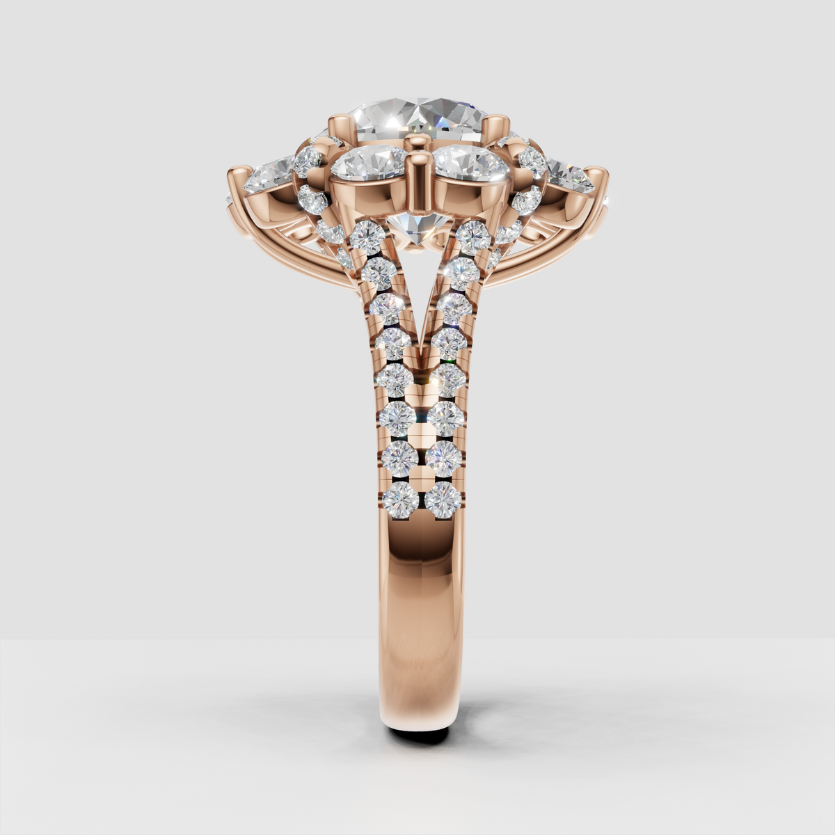 Pavé split shoulder round diamond engagement ring in gold