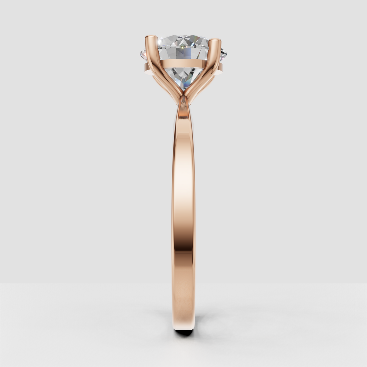Round cut diamond ring with elevated four-prong setting