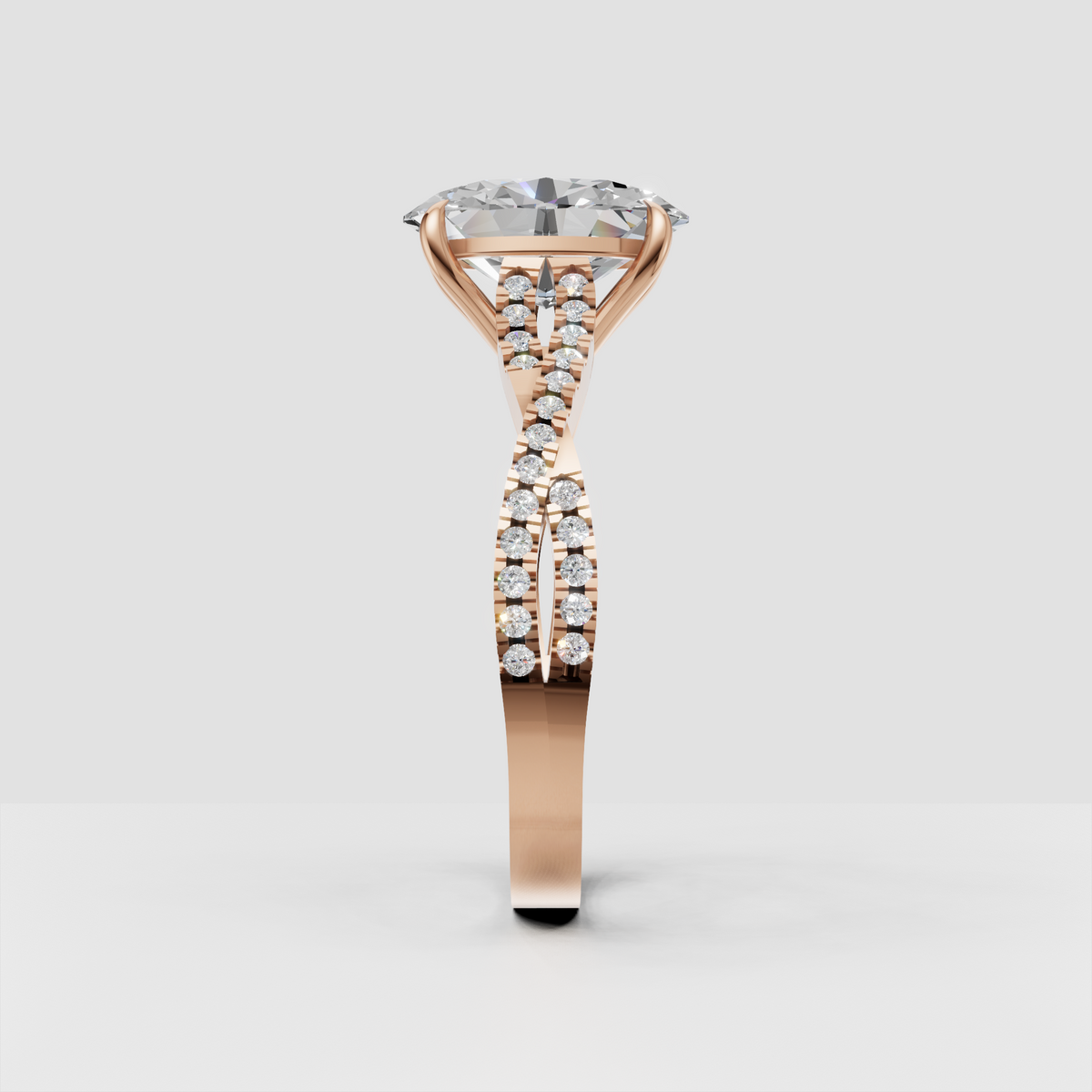 Contemporary pear diamond engagement ring with split shank design