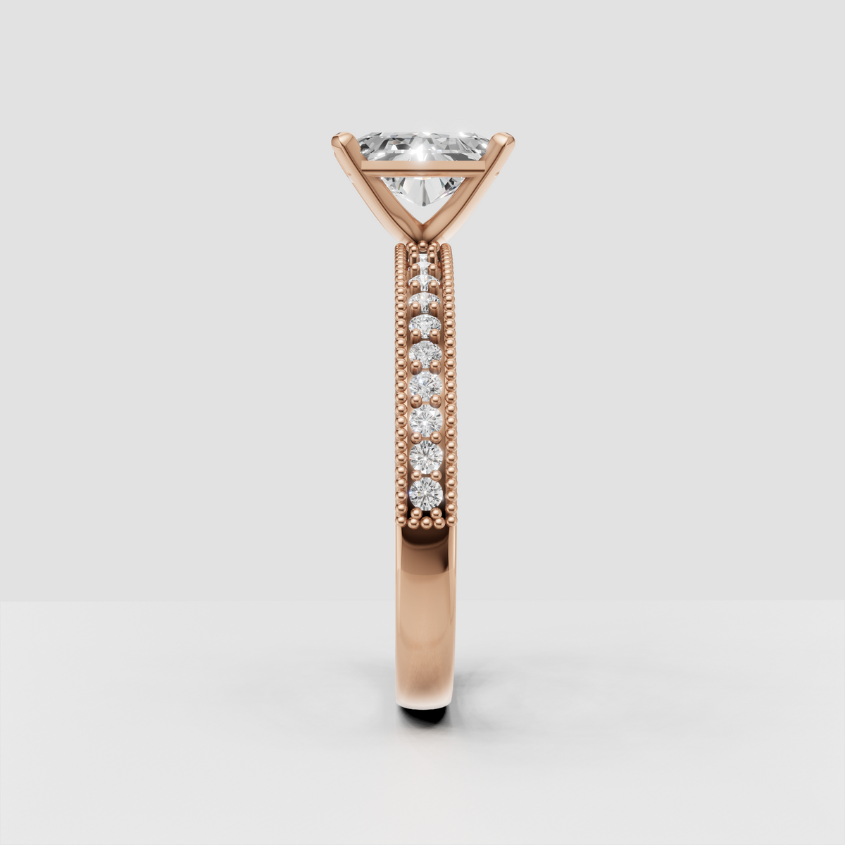 Luxury radiant diamond engagement ring with ornate milgrain-accented band