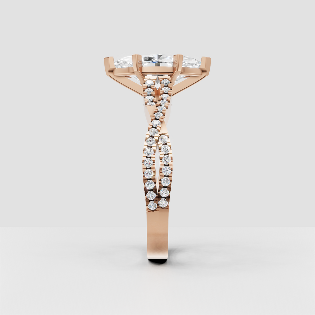 Front view of marquise cut diamond engagement ring with six gold prongs and pavé split shank.