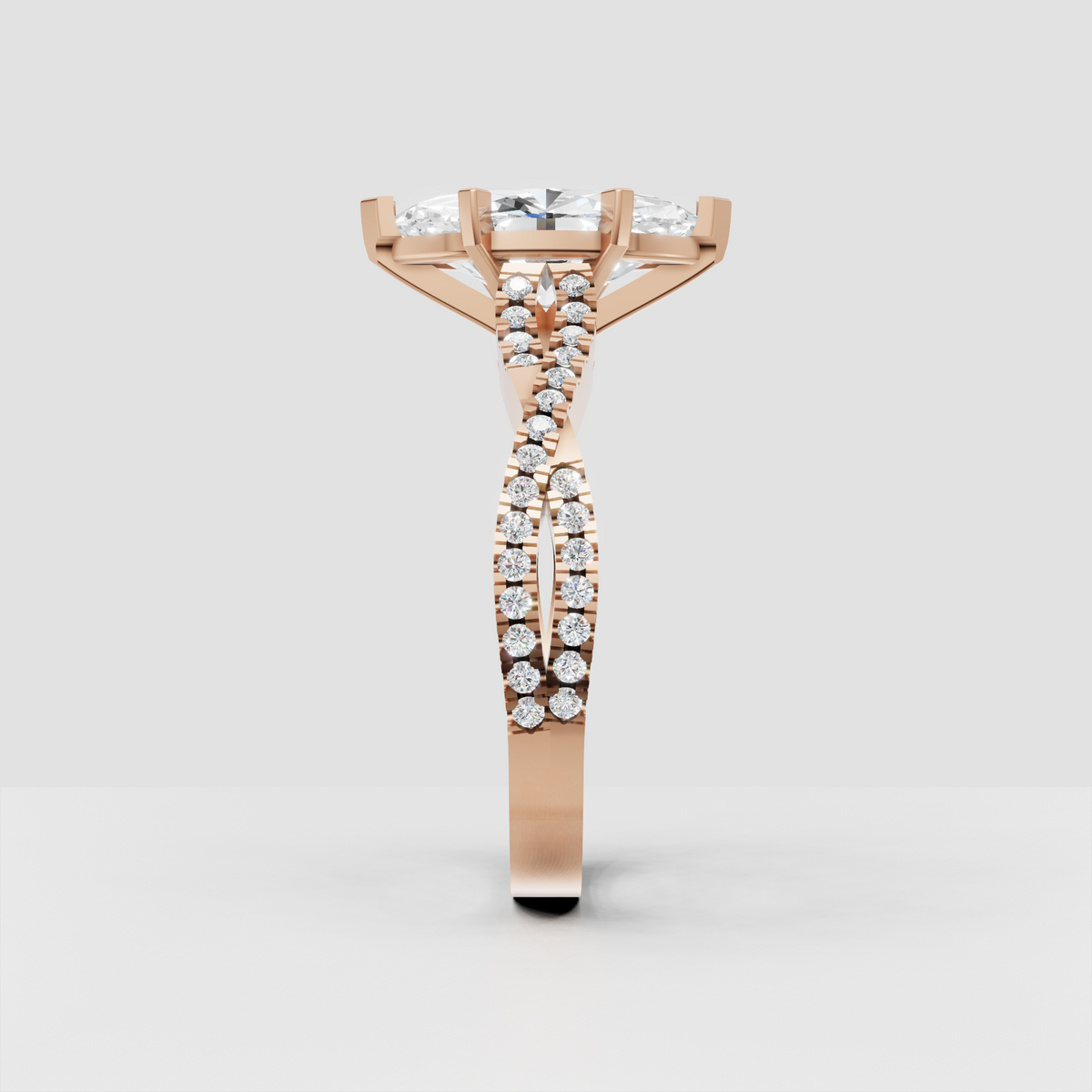 Front view of marquise cut diamond engagement ring with six gold prongs and pavé split shank.