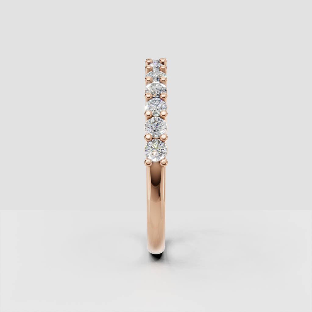 Close-up of round diamonds in a polished prong setting