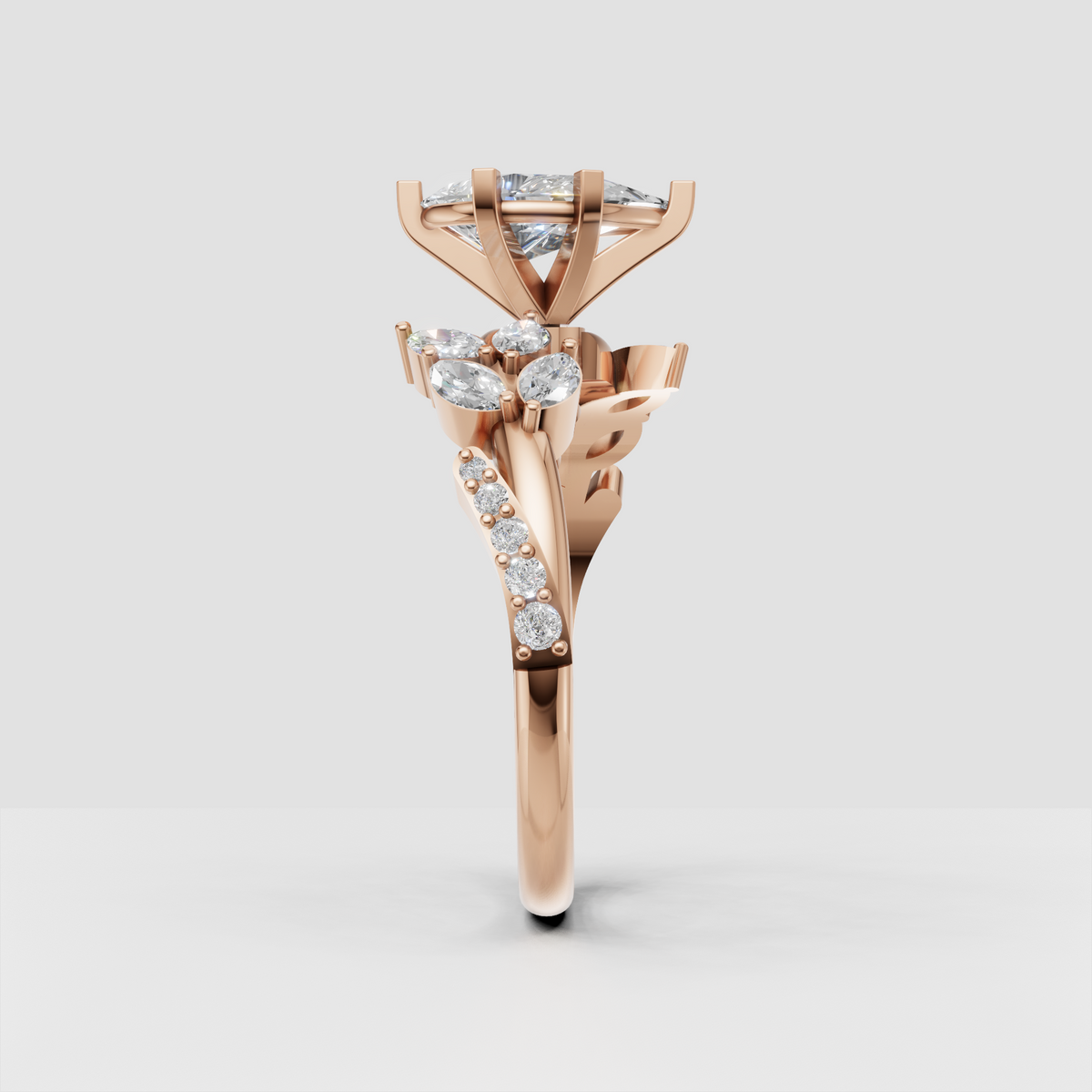 Elegant pear cut diamond ring with organic botanical detailing