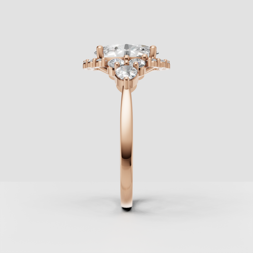 Oval diamond halo engagement ring in yellow gold setting