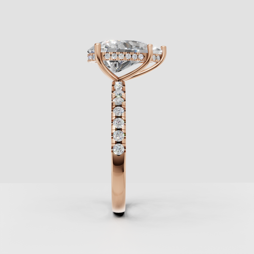 Side profile of yellow gold pear Diamond solitaire engagement ring