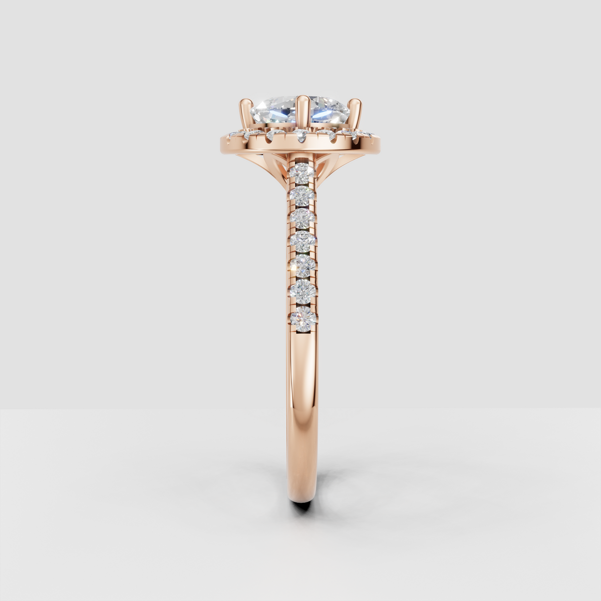 Cushion cut diamond halo ring with elegant yellow gold setting and side stones