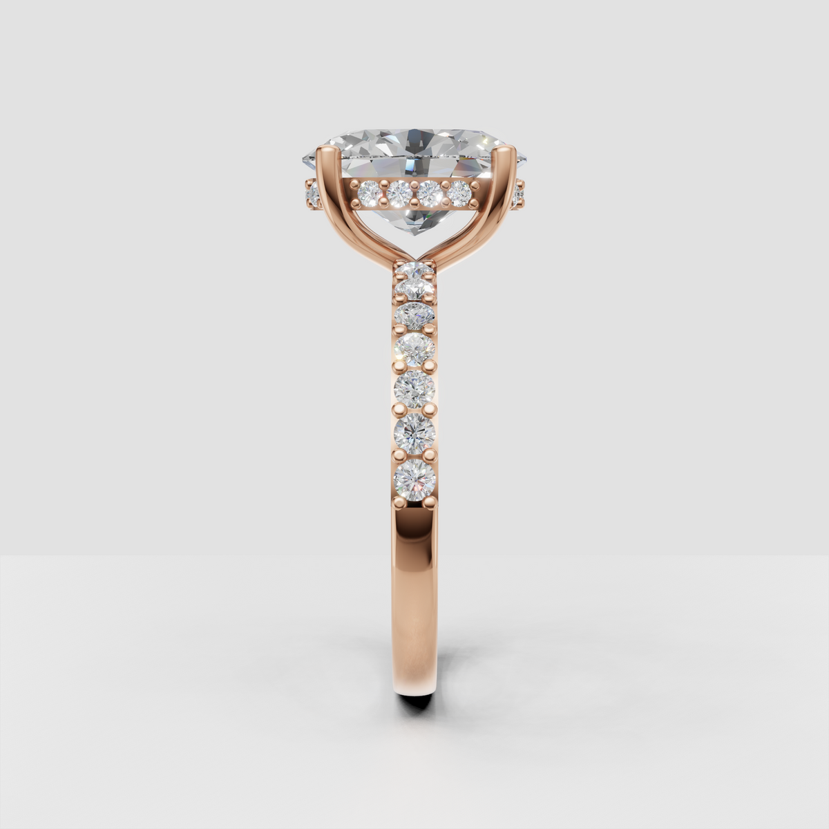 Oval diamond hidden halo bridal jewelry in a refined setting