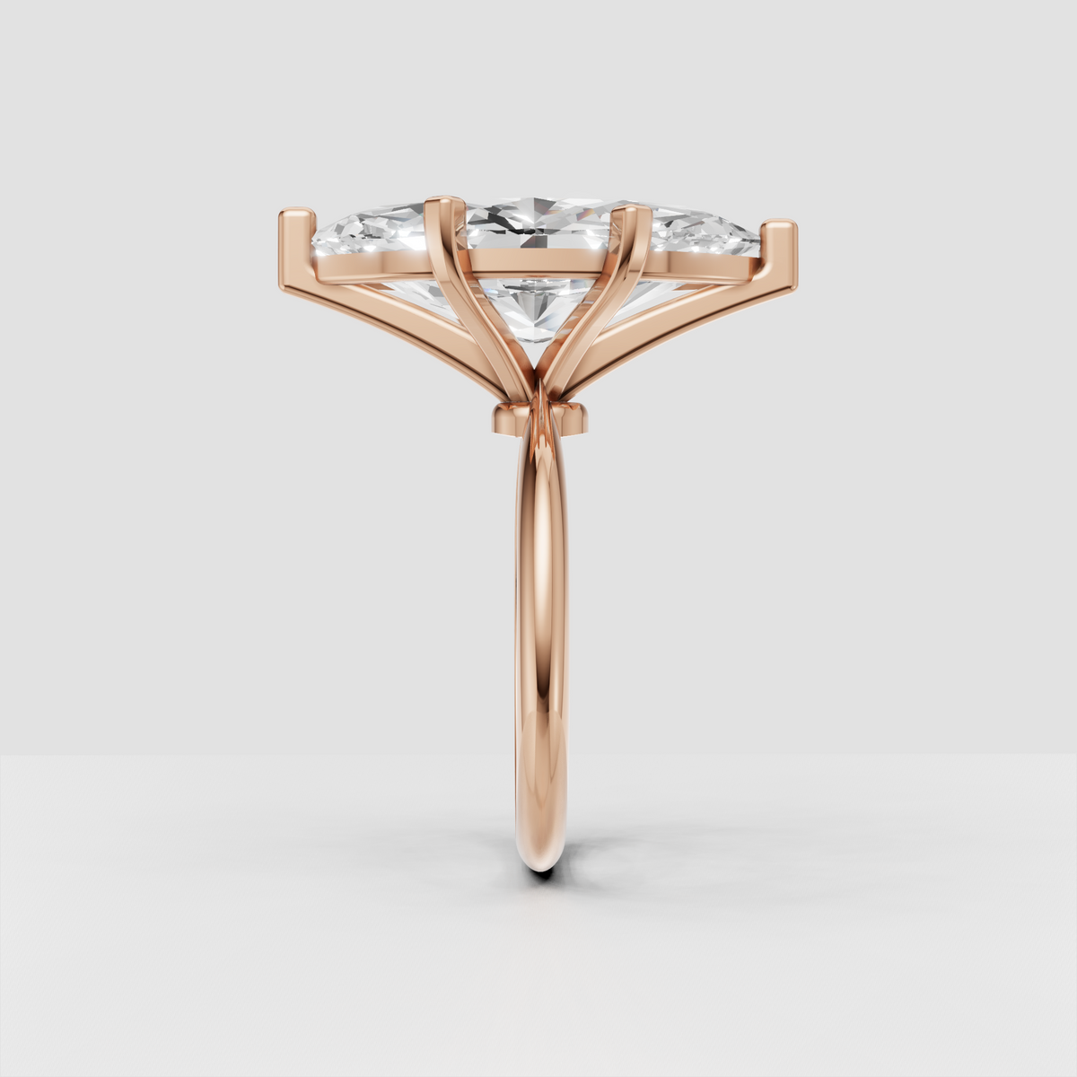 Gold marquise engagement ring with secure prong setting