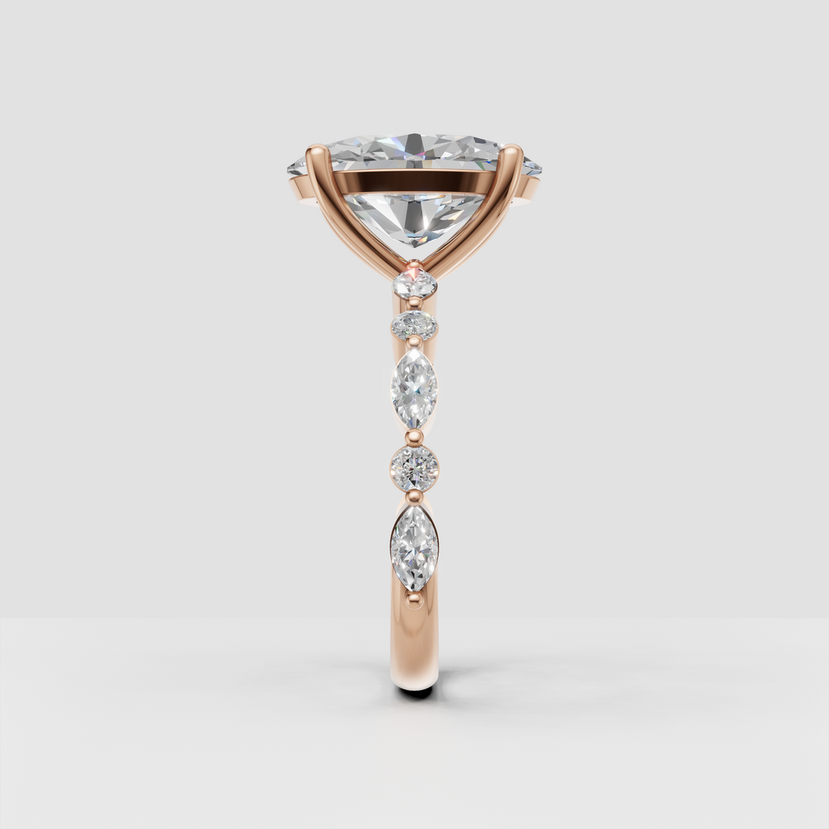 Oval diamond engagement ring with sculpted shoulders