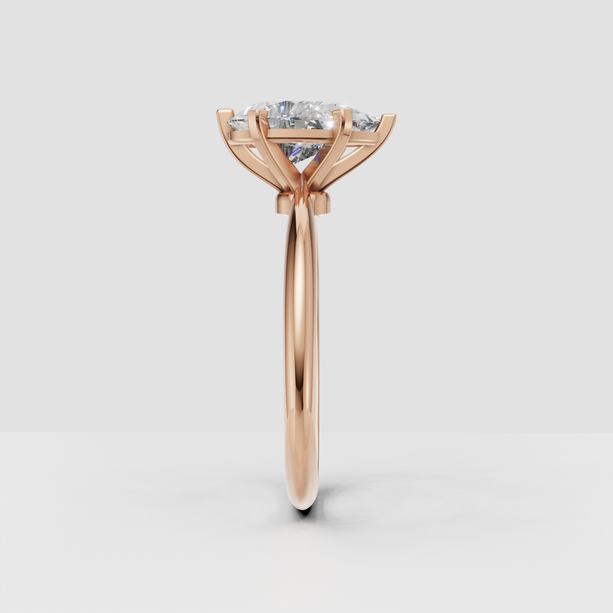 Pear-Shaped Diamond Solitaire Reverse Tapered Shank Engagement Ring