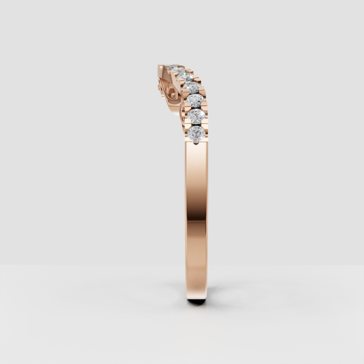 Round diamond anniversary band with intricate openwork gallery in yellow gold