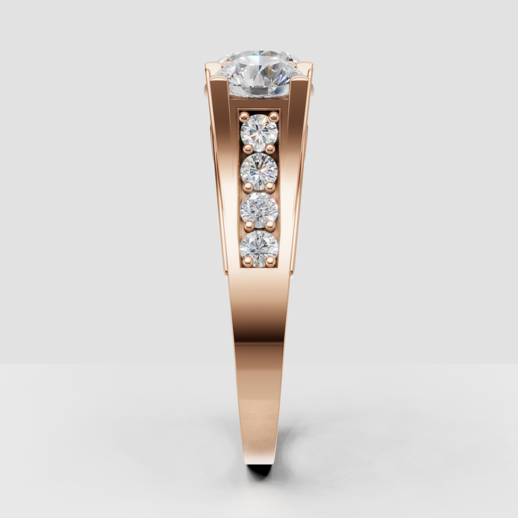 Side profile of yellow gold round Diamond three-stone engagement ring