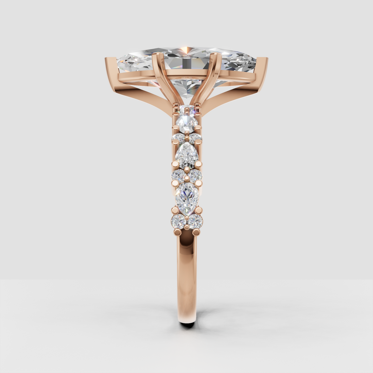 Marquise diamond ring with round brilliant accents
