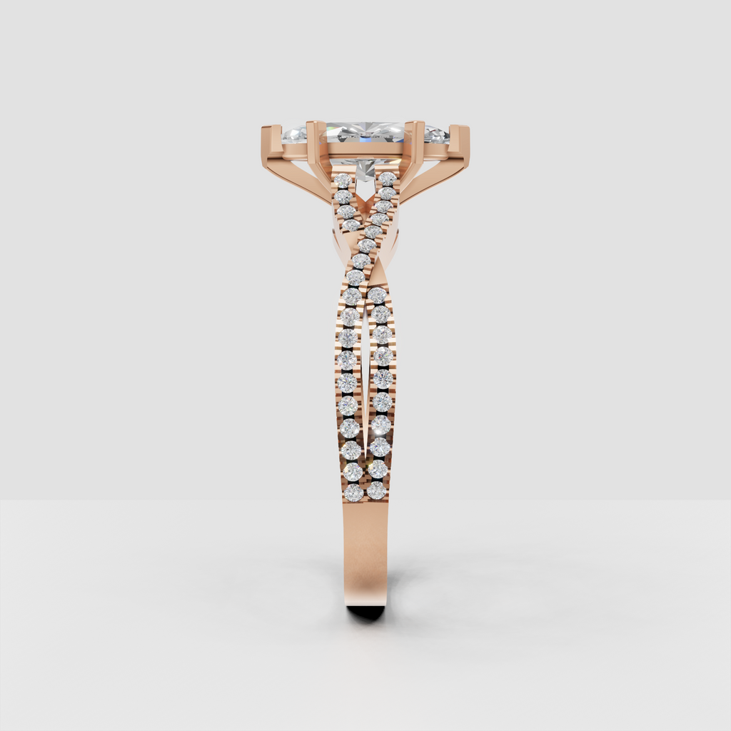 Marquise diamond engagement ring with intricate split shank and side stones
