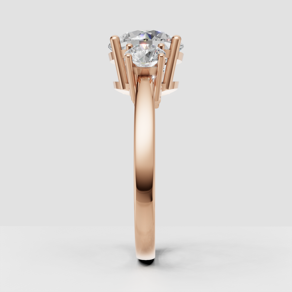 Round diamond ring with matching side stones
