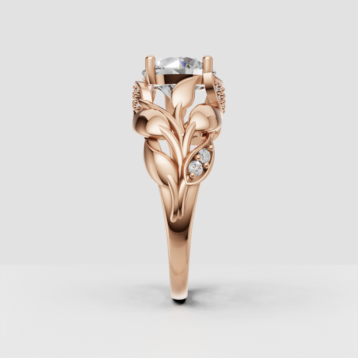 Round diamond nature inspired ring shown in rose gold