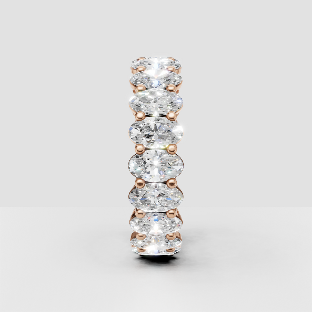 Sophisticated oval diamond eternity ring side perspective