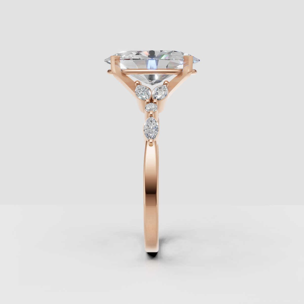 Modern oval diamond engagement ring with detailed shoulders