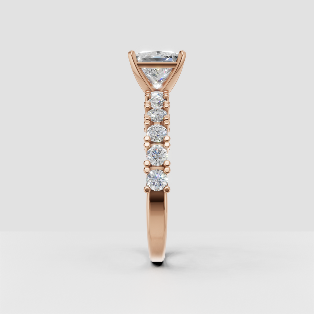 Princess cut diamond engagement ring with detailed side stone setting