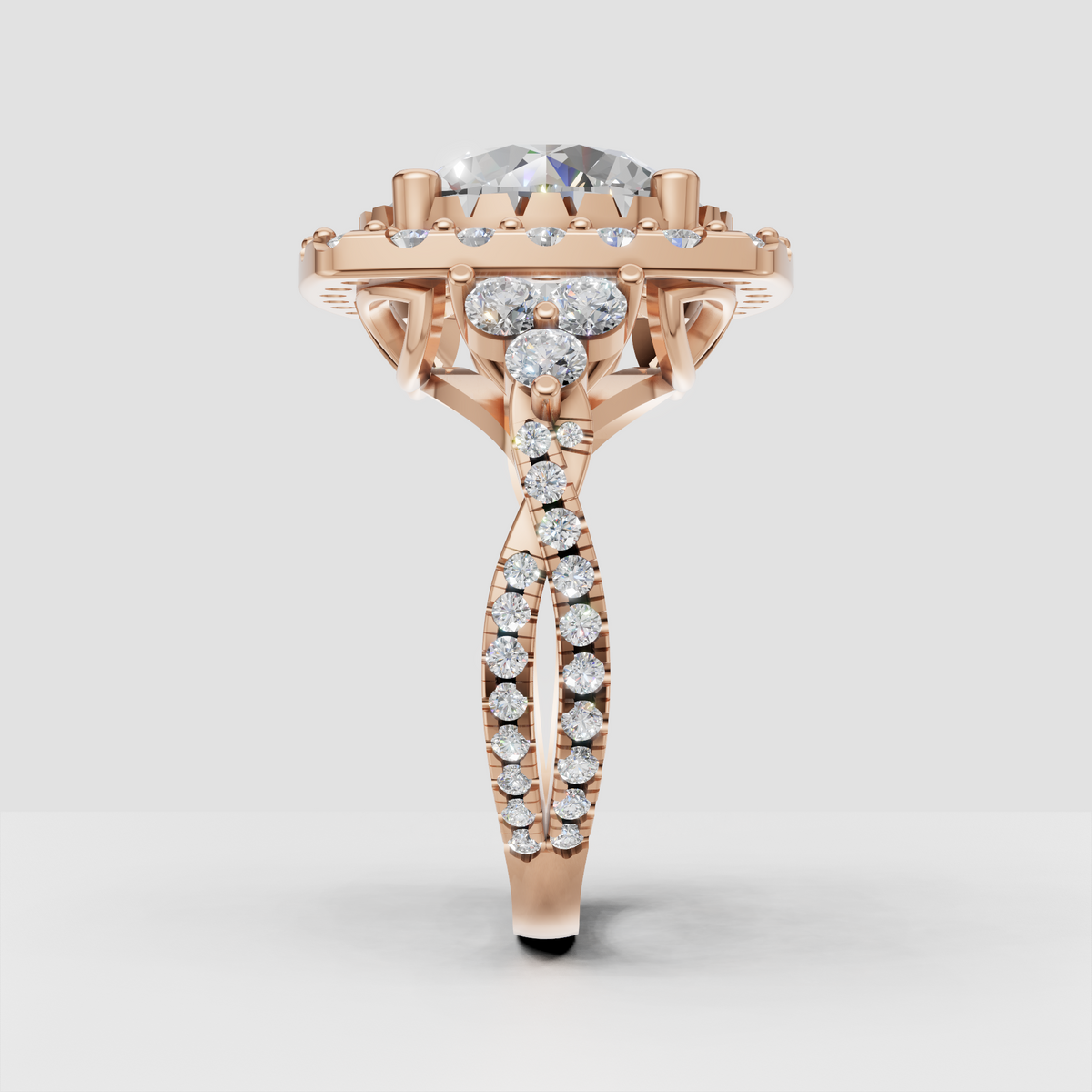 Round diamond engagement ring with detailed open gallery and side stones