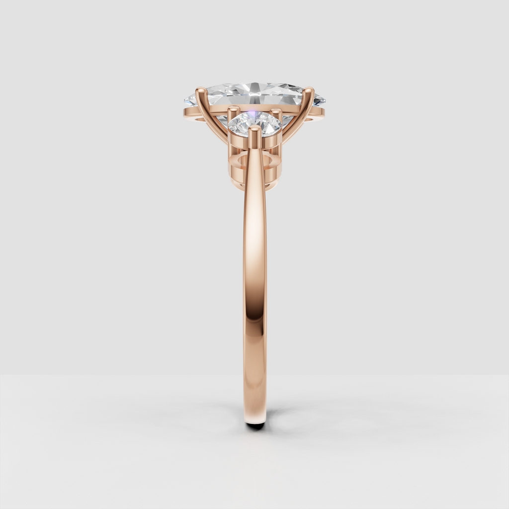 Elegant three stone diamond ring featuring an oval center stone