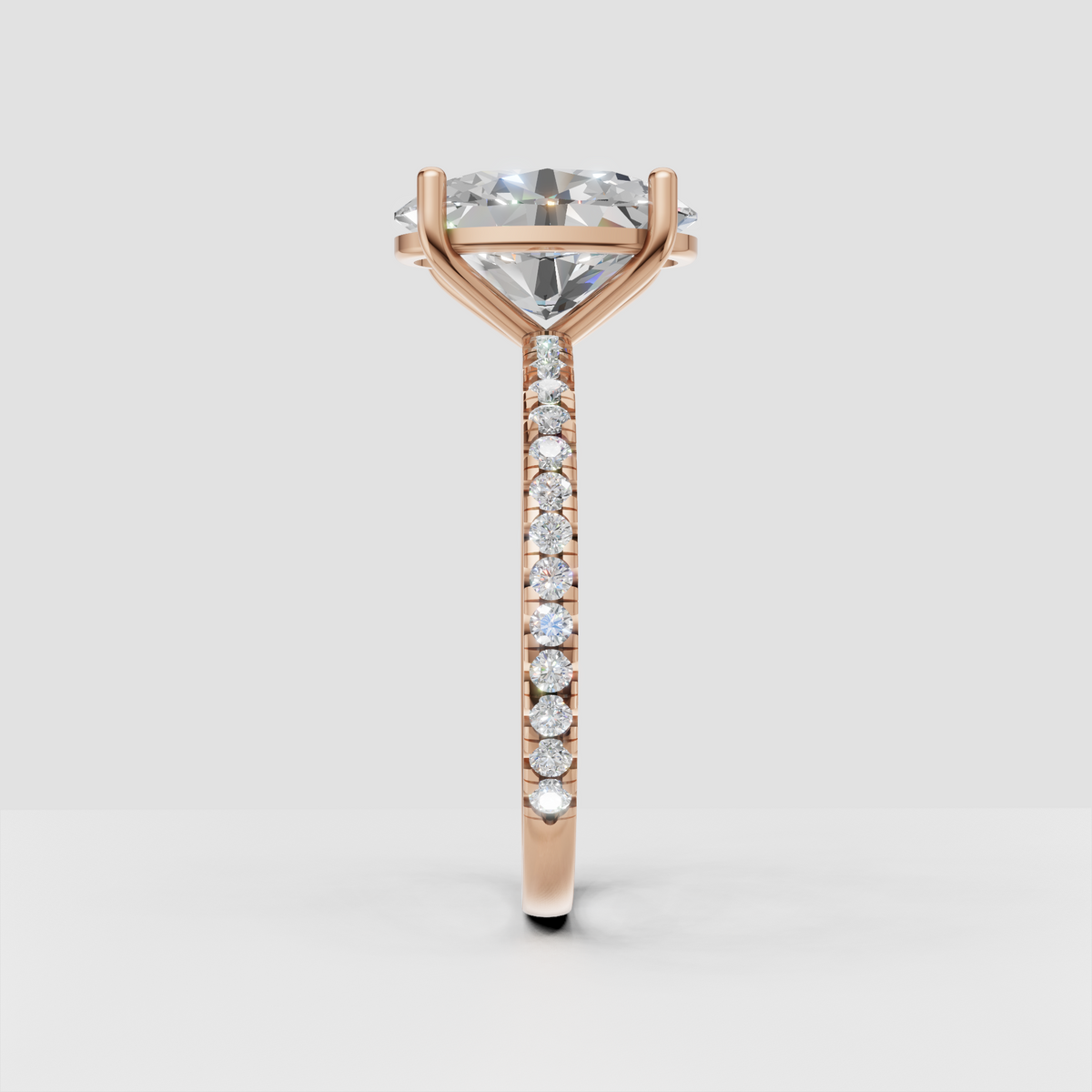Oval diamond ring with elevated four-prong cathedral setting