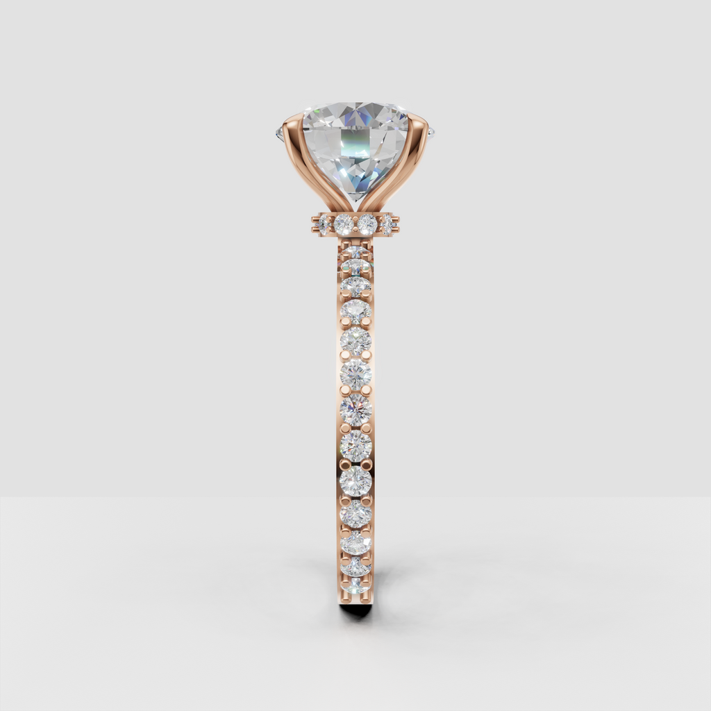 Brilliant round diamond ring with sparkling shoulder stones and gold shank