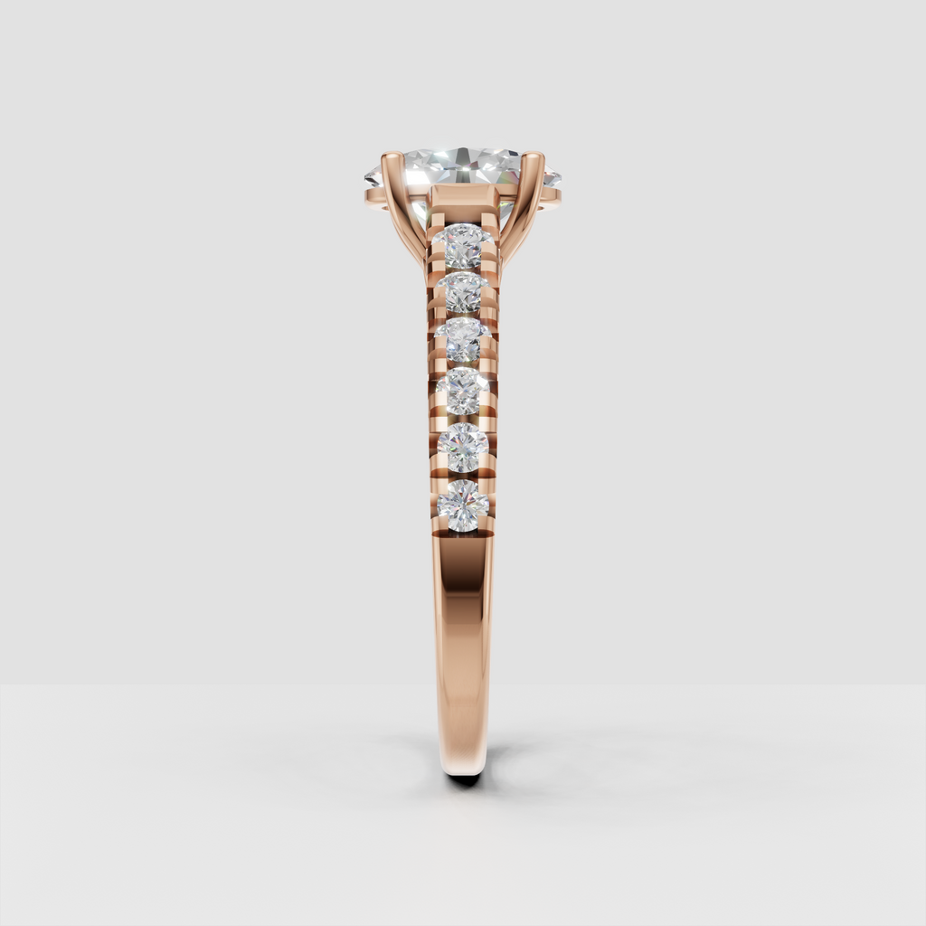 Oval diamond ring showing detailed four-prong center setting