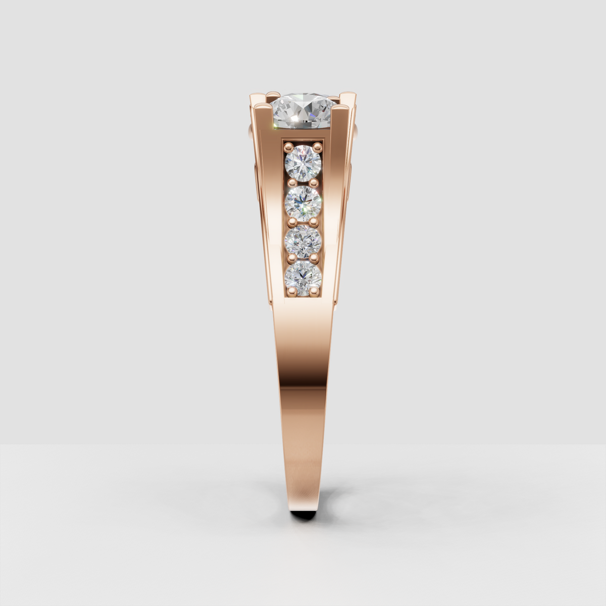 Three-stone round diamond ring with sparkling pave side detailing