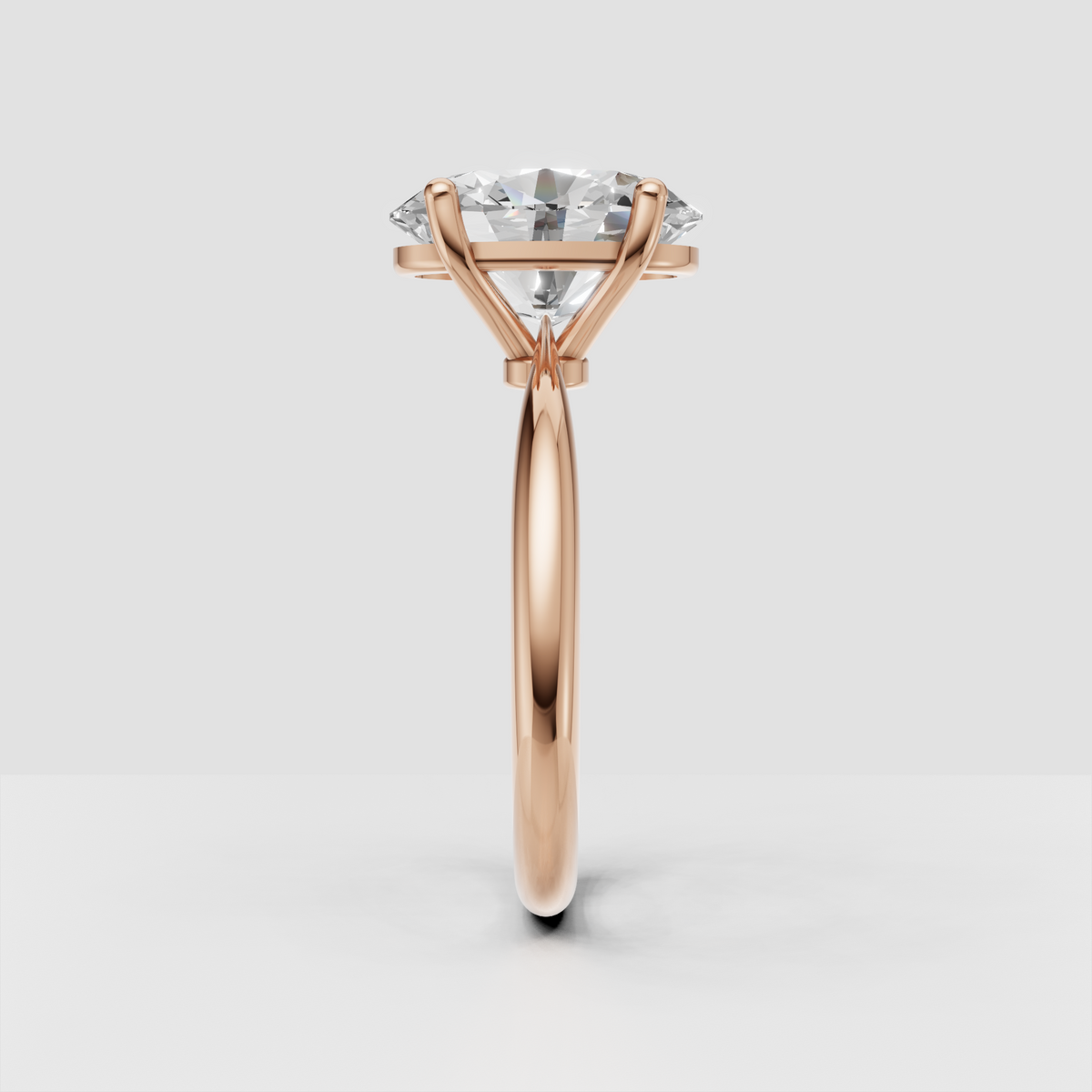 Side profile of yellow gold oval Diamond solitaire engagement ring