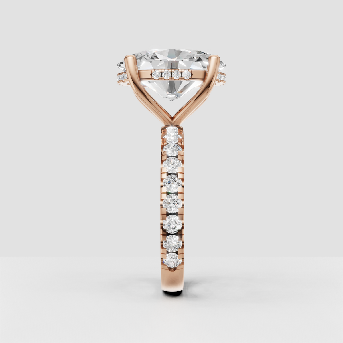 Oval cut diamond ring with hidden halo beneath center stone