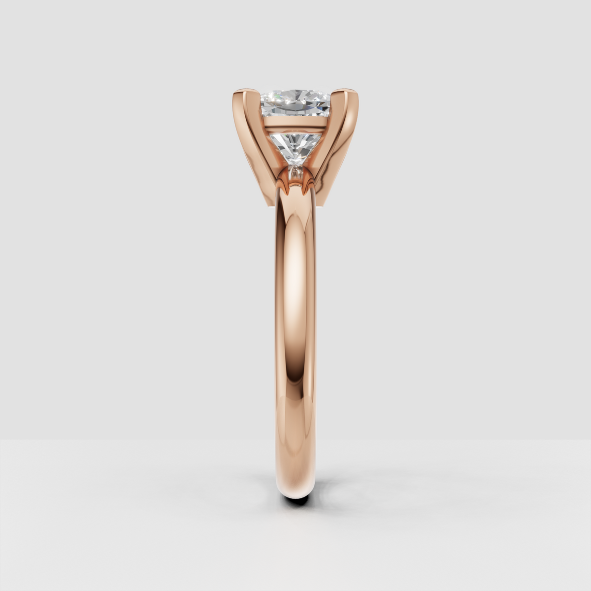 Cushion cut diamond engagement ring with smooth gold band