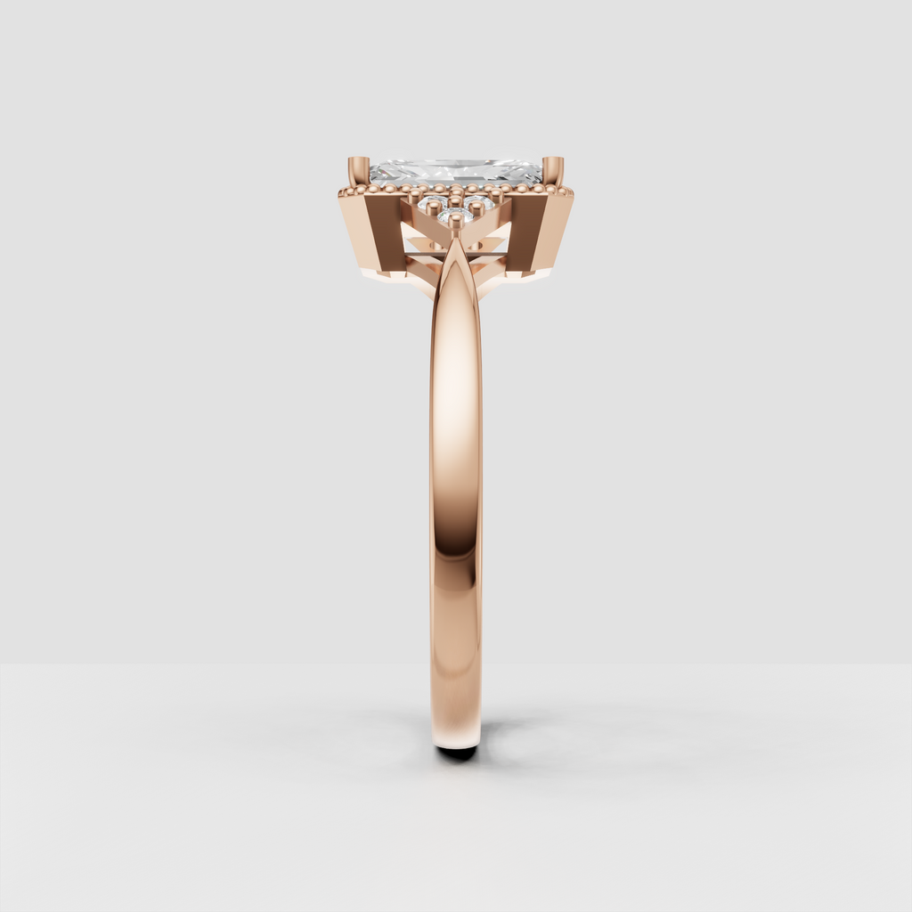 Vintage-inspired yellow gold diamond engagement ring with halo detailing