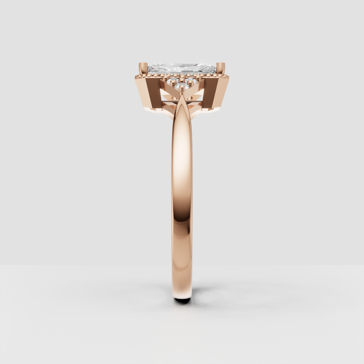 Vintage-inspired yellow gold diamond engagement ring with halo detailing