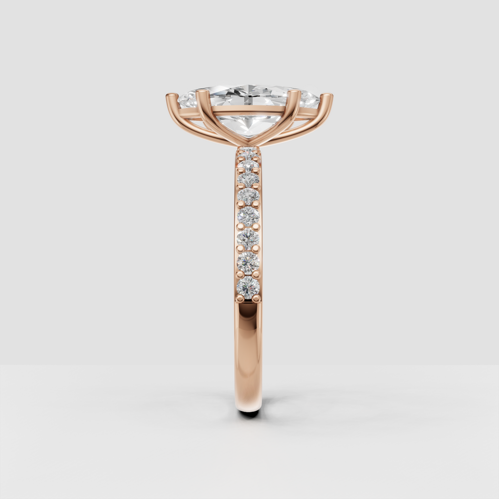 Side view of marquise diamond ring with elevated basket setting