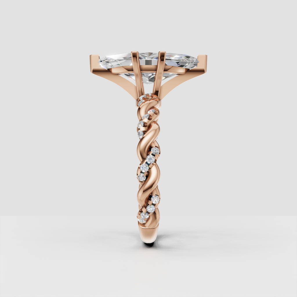 Sculptural marquise cut engagement ring in polished rose gold