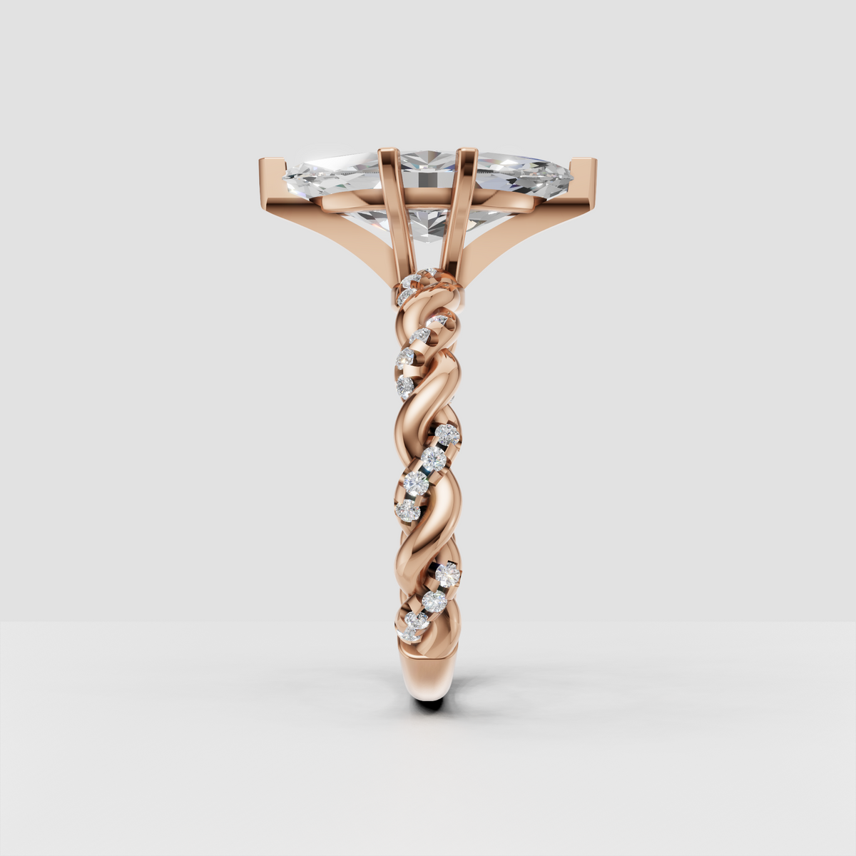 Sculptural marquise cut engagement ring in polished rose gold